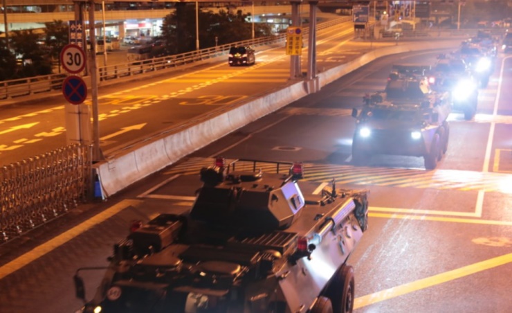 China rotates new troops into Hong Kong amid mass protests