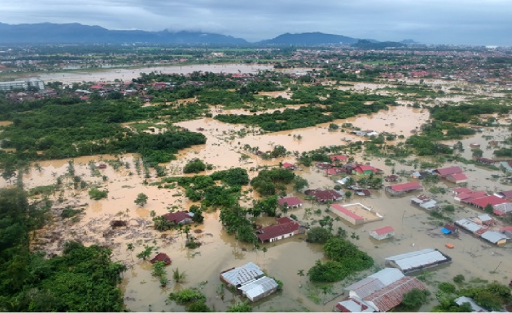 Floods and landslides kill 26 in Indonesia